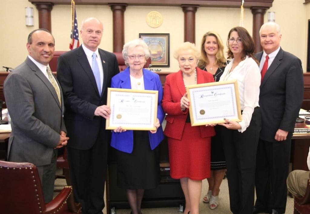 The Monmouth County Board of Chosen Freeholders presents certificates of recognition to Principal Sister Margo Kavanaugh and teacher Karen Massimilo, both from St. Catharine School, Spring Lake, in honor of Fair Housing Month at their workshop meeting on April 23 in Freehold, NJ.Pictured left to right:Freeholder Thomas A. Arnone, Freeholder Director Gary J. Rich, Sr., Sister Margo Kavanaugh, Freeholder Lillian G. Burry, Freeholder Deputy Director Serena DiMaso, Karen Massimilo and Freeholder John P. Curley.